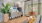 Lounge seating, complimentary coffee station, and a private co-working meeting room