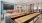 Game lounge with billiards table, seating area, tv, and additional entertainment options