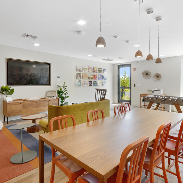 Ryder Revere Beach - Community Room With Wooden Dining Table